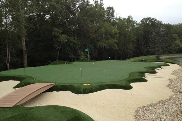 Augusta artificial putting green with natural surroundings